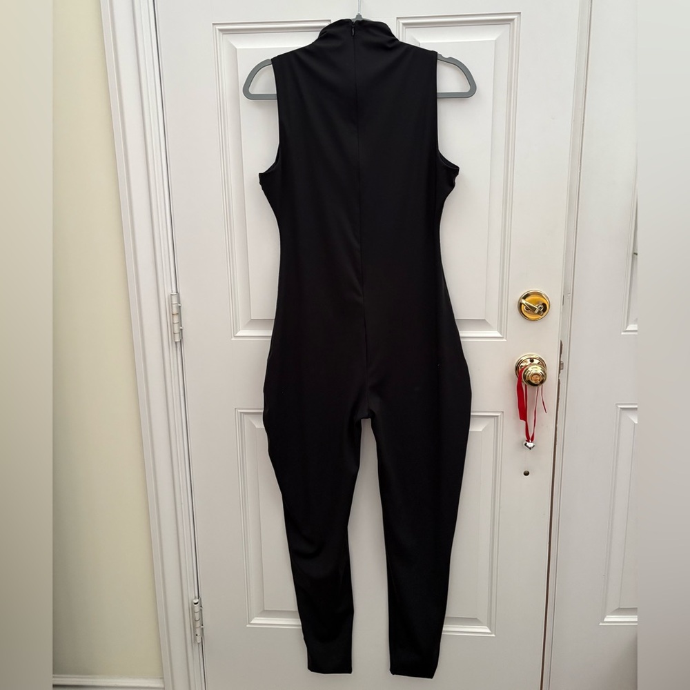 SKIMS All-In-One Mock Neck Sleeveless Back Zip Catsuit in Onyx